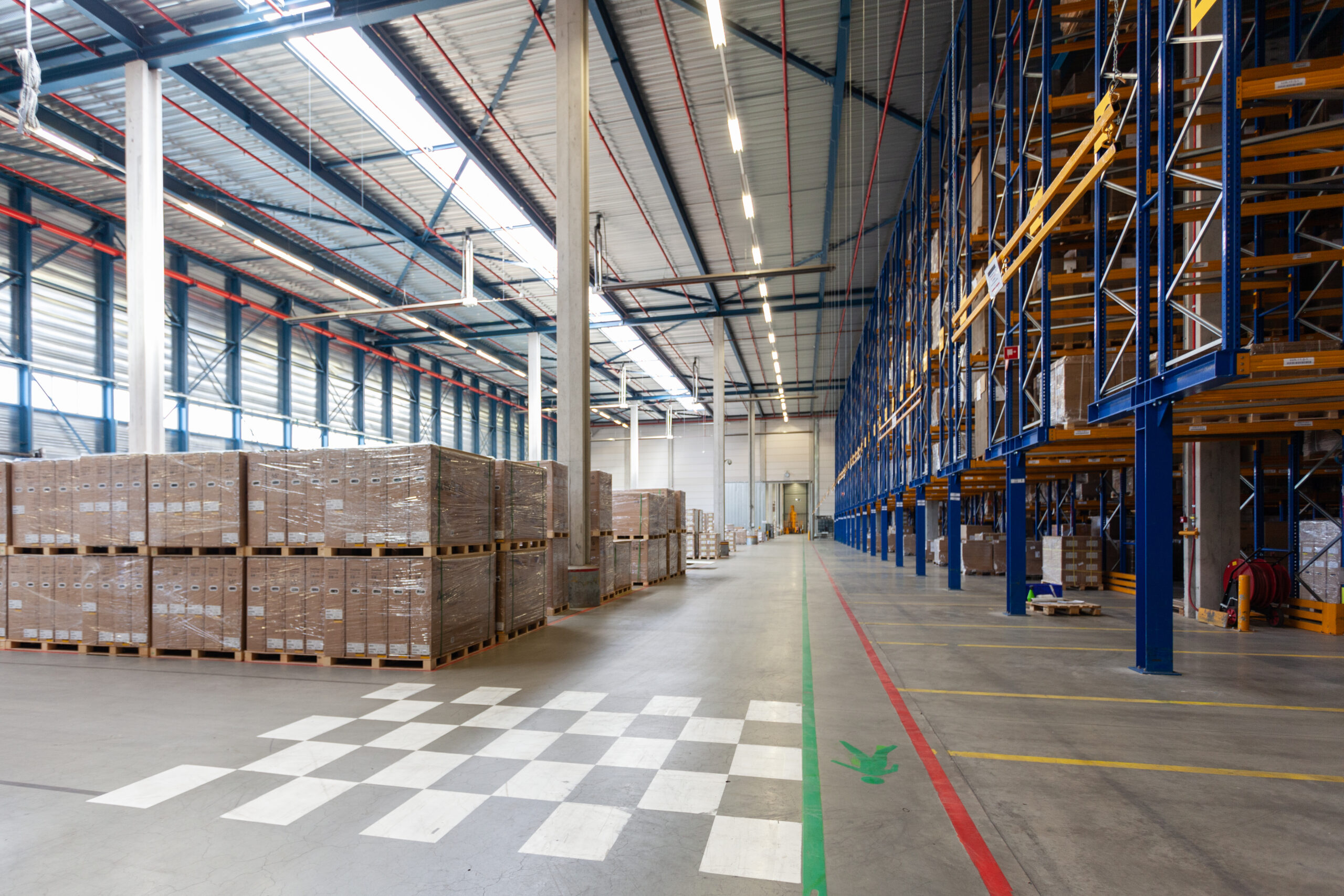 Warehouse racking with stock for distribution in Sabah and Sarawak
